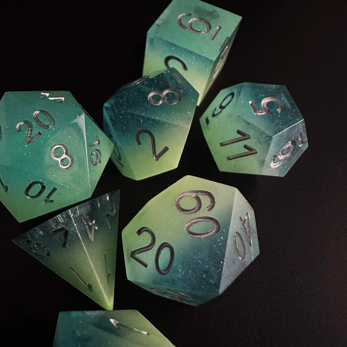 Lichs Fire- Handmade Glow in the Dark 7 piece handmade sharp edge dice shops set +crystal D4